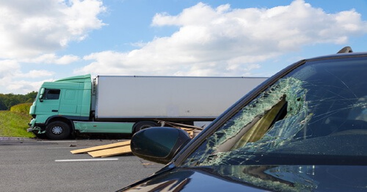 car windshield broken due to truck accident